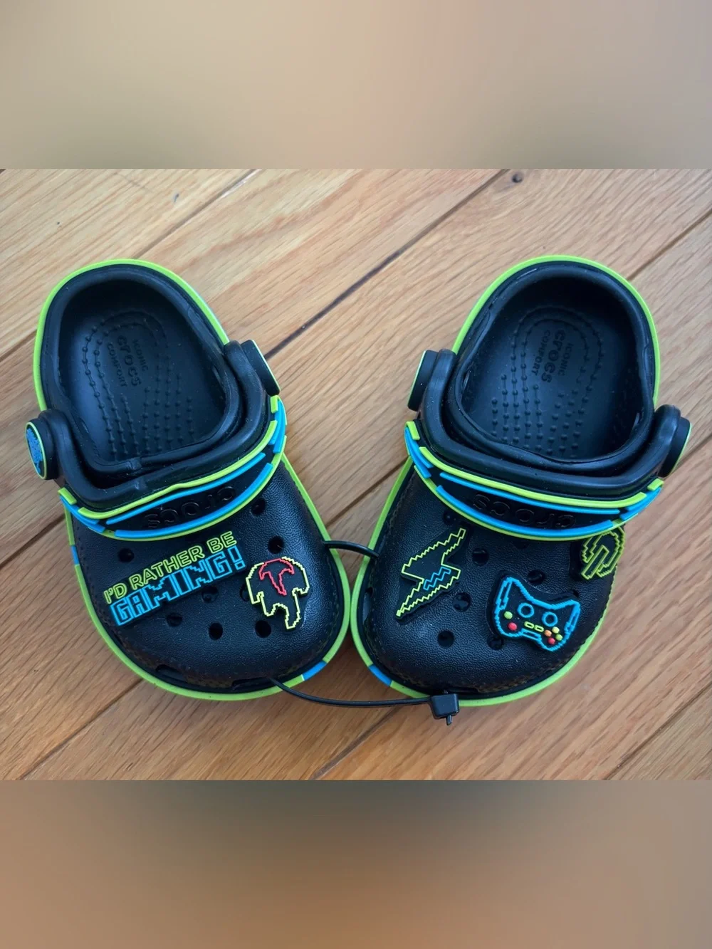 CROCS Toddler’s Black Clogs with Neon Green and Blue Trim and Gamer Jibbitz